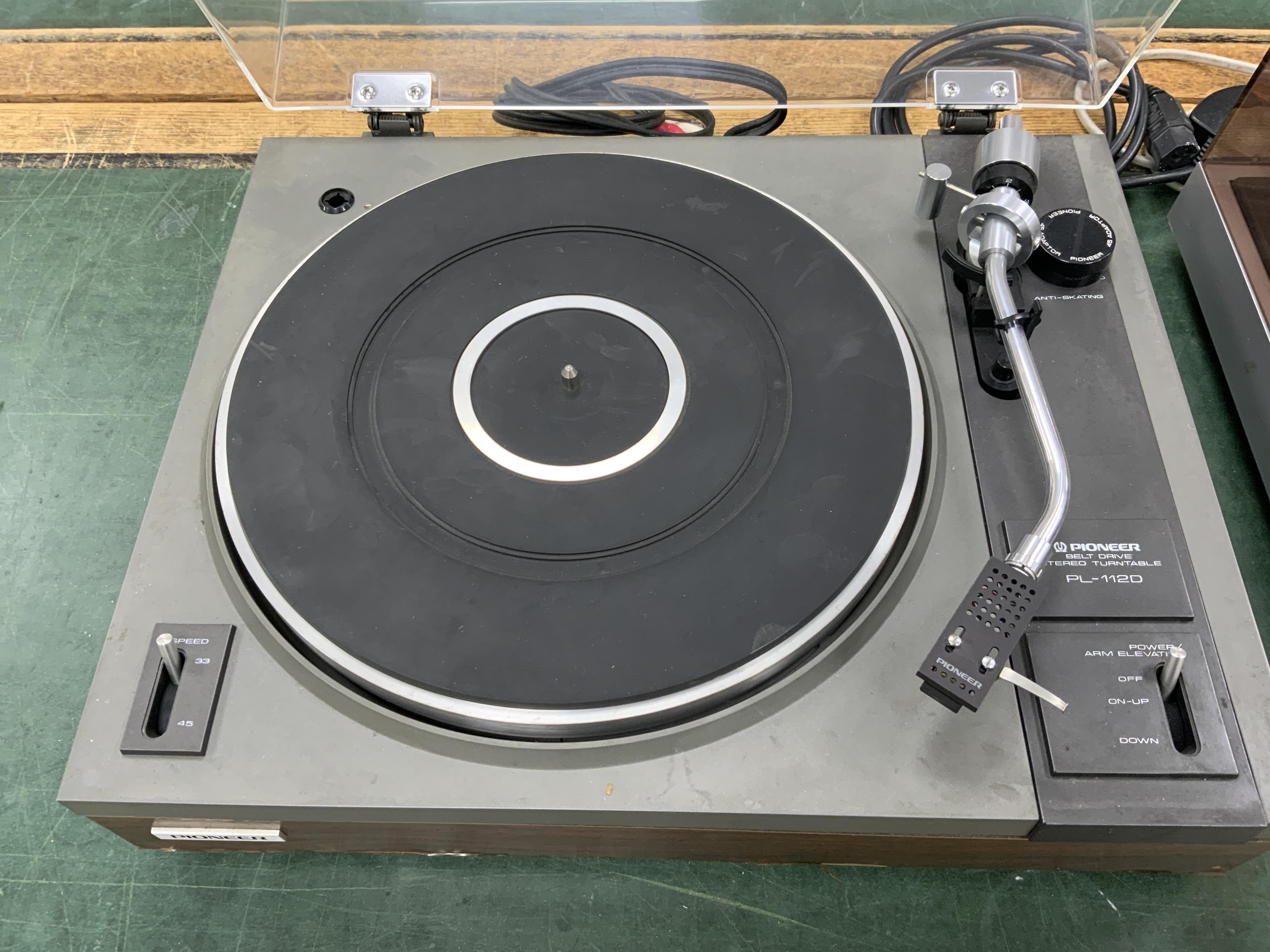 Two record players; a Philips 437 turntable together with a Pioneer PL-112D turntable, both with leads. Condition - fair to good